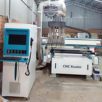 MÁY CNC CẮT GỖ CÔNG NGHIỆP BÀN HÚT CHÂN KHÔNG TỰ ĐỘNG 4 ĐẦU CẮT